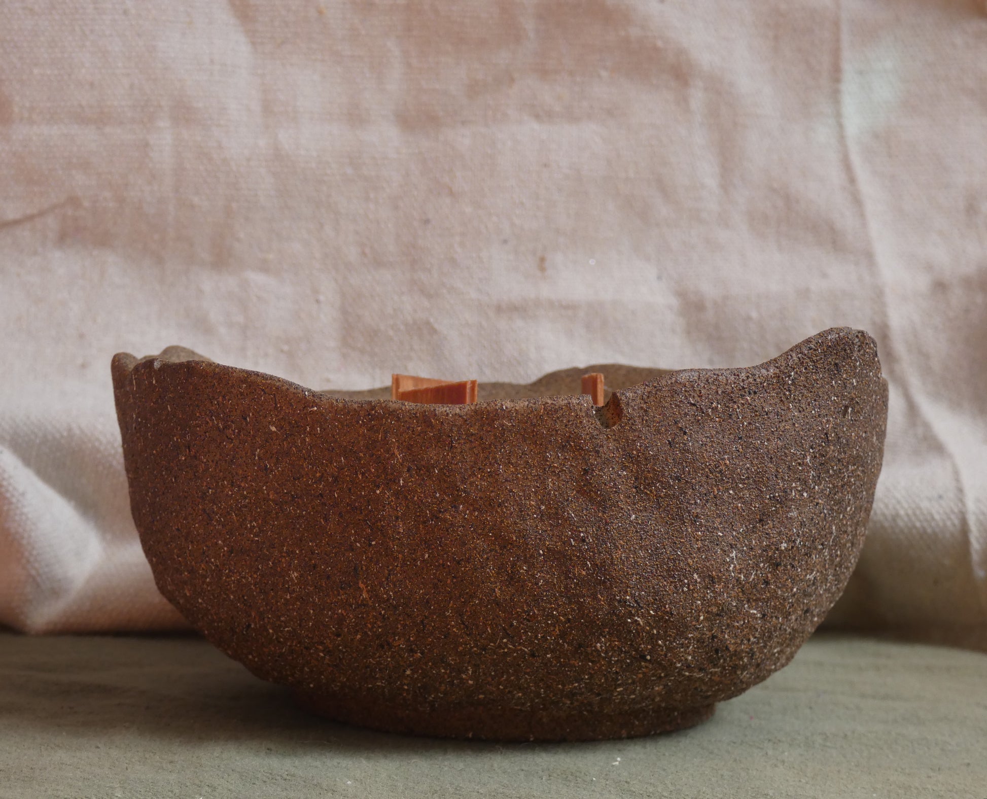 Citrus Berry Candle in a stoneware bowl